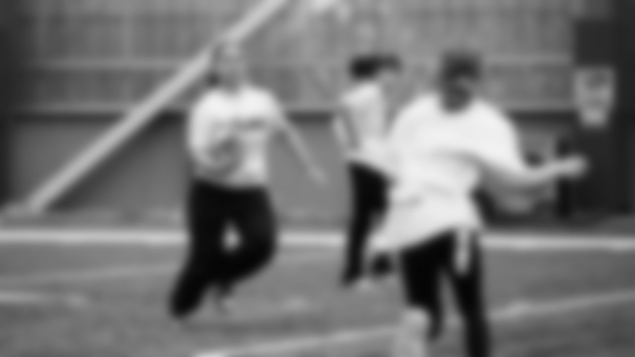 The Seahawks Women's Association packed girls flag kits and hosted a free girls flag football camp at the Seahawks training facility on Saturday, November 8, 2025.