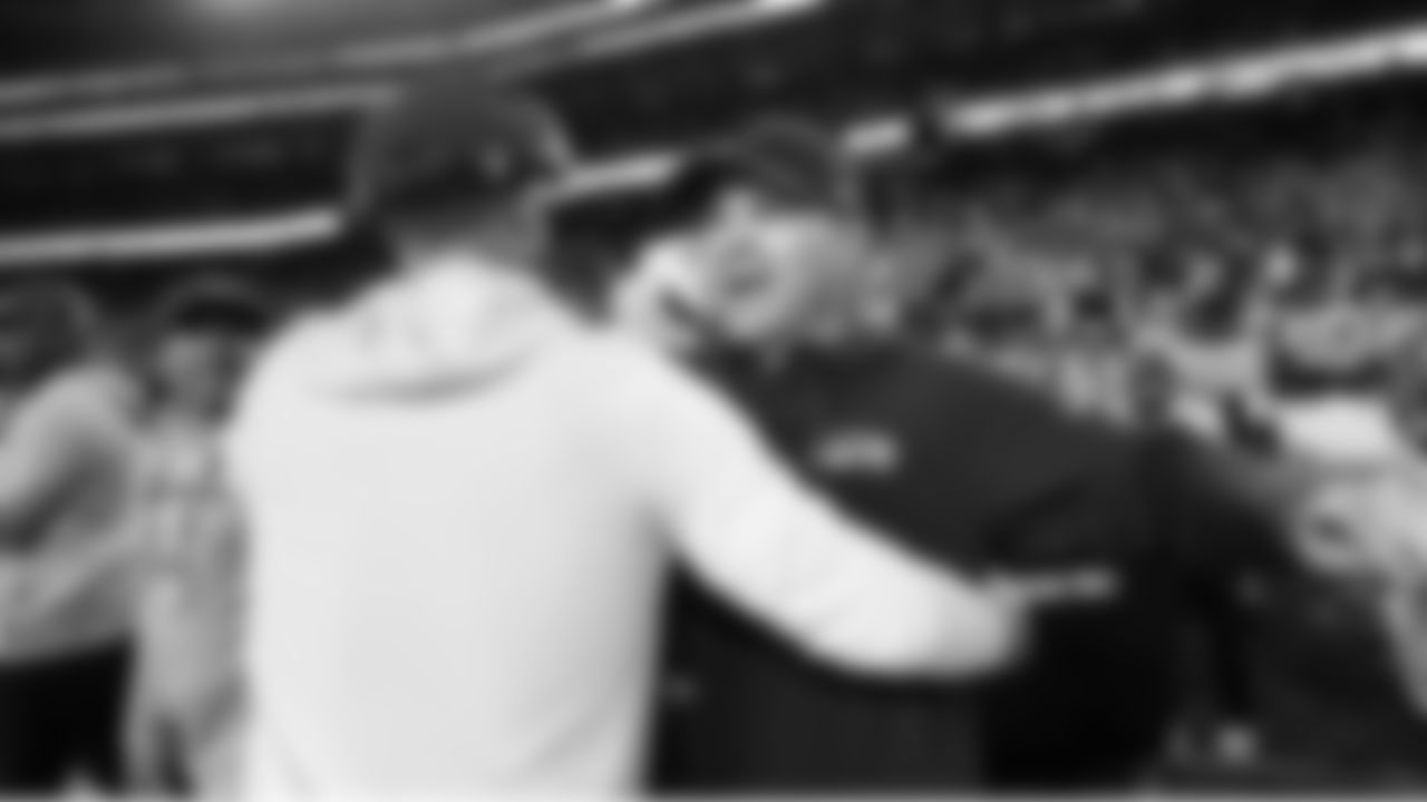 The clock reads 0:00 as Seahawks head coach Mike Macdonald celebrates his team's victory in the Super Bowl.