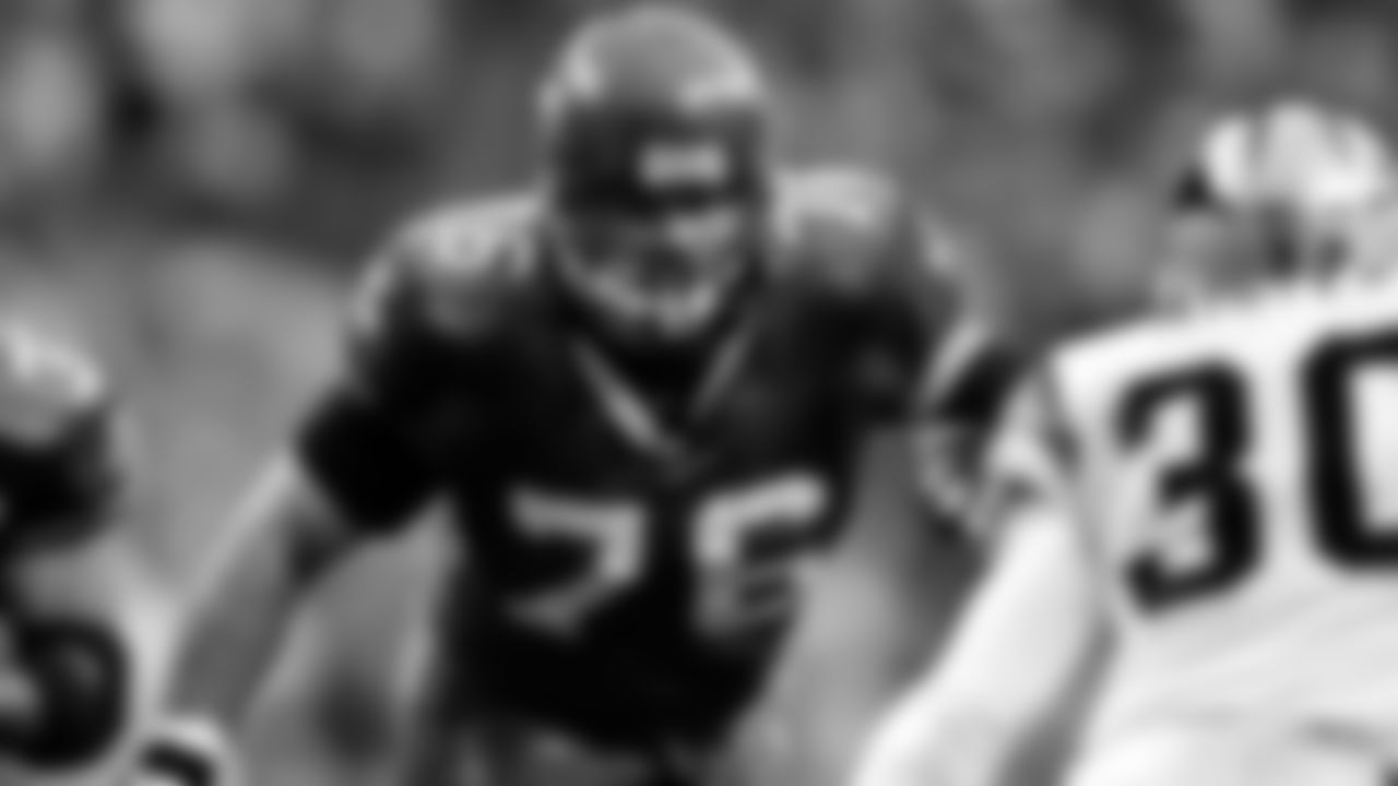 In this Jan. 22, 2006, file photo, Seattle Seahawks offensive tackle Steve Hutchinson blocks against the Carolina Panthers during the NFC championship football game in Seattle. (AP Photo/John Froschauer, File)