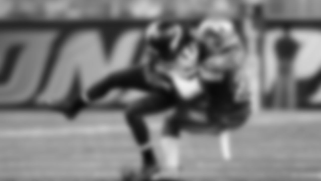 Minnesota Vikings wide receiver Jarius Wright (17) is tackled by Detroit Lions cornerback Quandre Diggs (28) during an NFL football game, Sunday, Oct. 25, 2015, in Detroit. (AP Photo/Rick Osentoski)