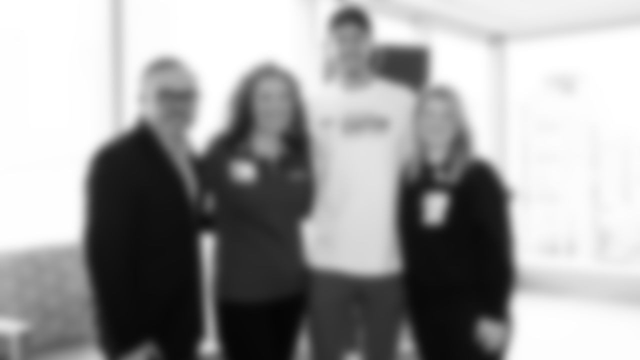 Seahawks wide receiver Jake Bobo presented the official game ball to Virginia Mason Franciscan Health on October 28, 2025.