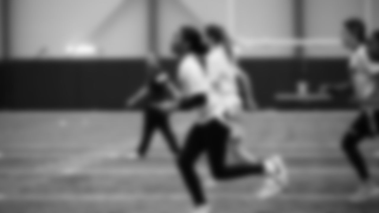 The Seahawks Women's Association packed girls flag kits and hosted a free girls flag football camp at the Seahawks training facility on Saturday, November 8, 2025.