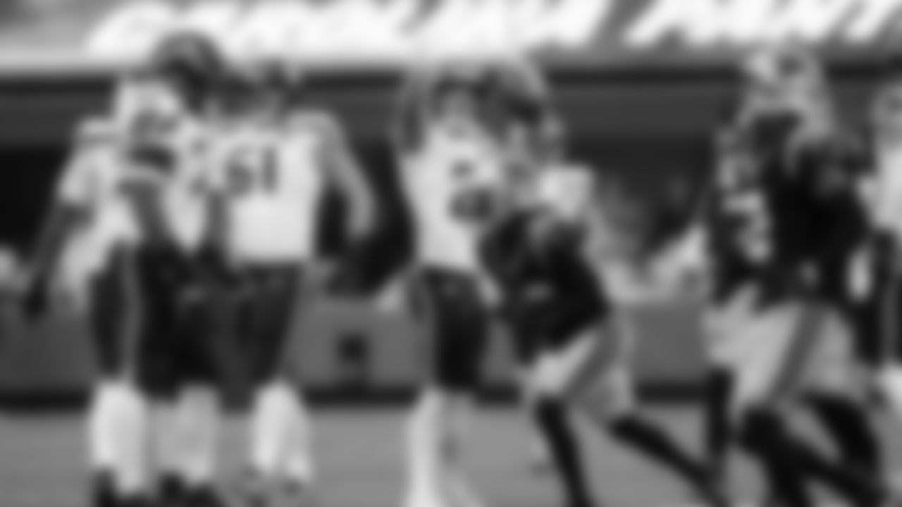 Seahawks running back Zach Charbonnet signals first down after a long gain in the first quarter.