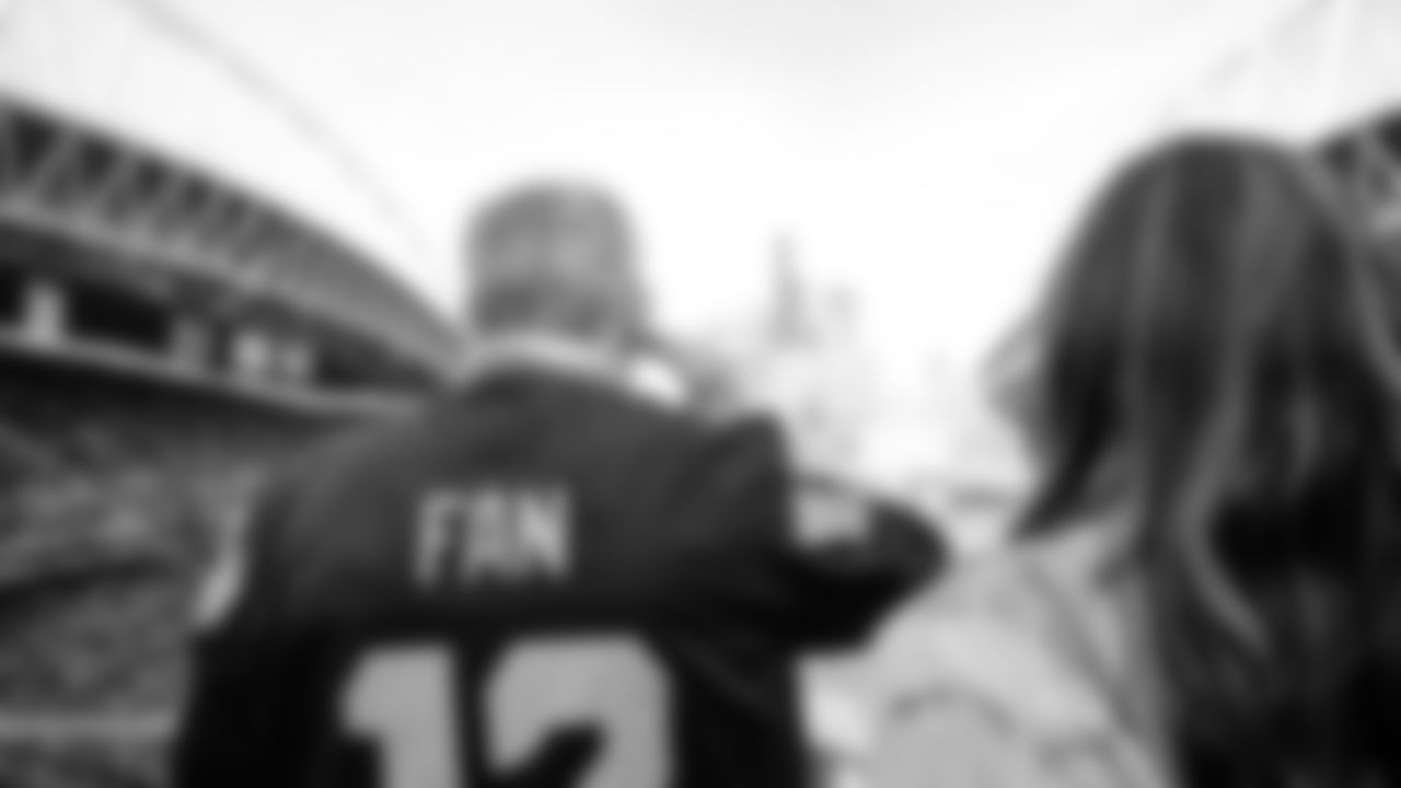 Brigadier General Richard Steve Ritchie "Cinco" of United States Air Force, raised the 12 Flag prior to kickoff of the Week 10 matchup vs. the Cardinals.