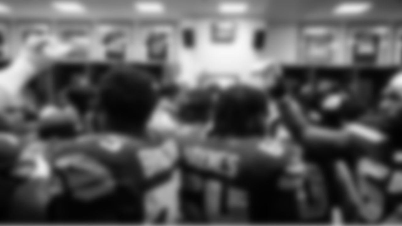 At halftime, the team huddled one last time before the second half.