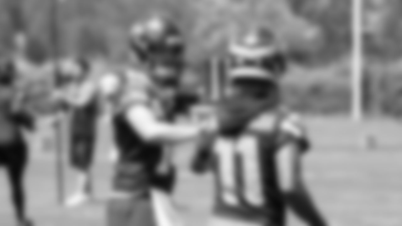 Seahawks quarterback Sam Darnold (14) and wide receiver Jaxon Smith-Njigba (11) participated in a workout on day one of OTAs on Tuesday, May 27, 2025 at the Virginia Mason Athletic Center.
