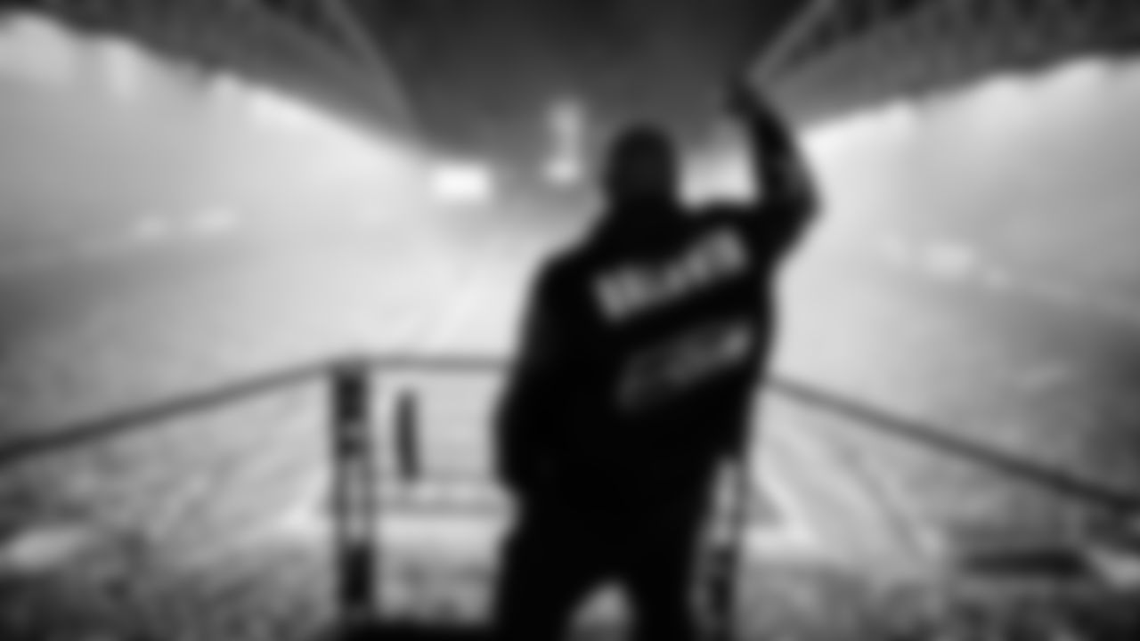 Seahawks Legend Doug Baldwin raising the flag in the 2025 Divisional Round on January 17, 2025.