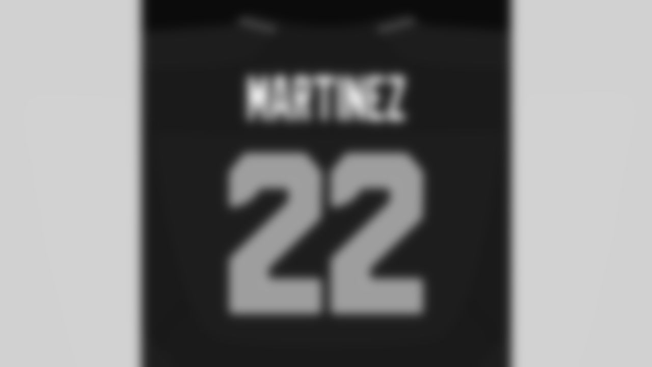 Seahawks running back Damien Martinez (22).