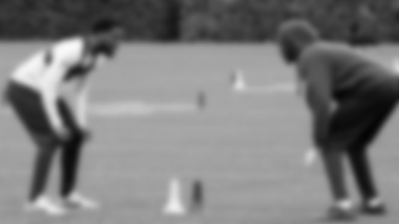 Seahawks cornerback Devon Witherspoon (21) and cornerback Riq Woolen (27) participated in a workout on May 13, 2025 at the Virginia Mason Athletic Center.