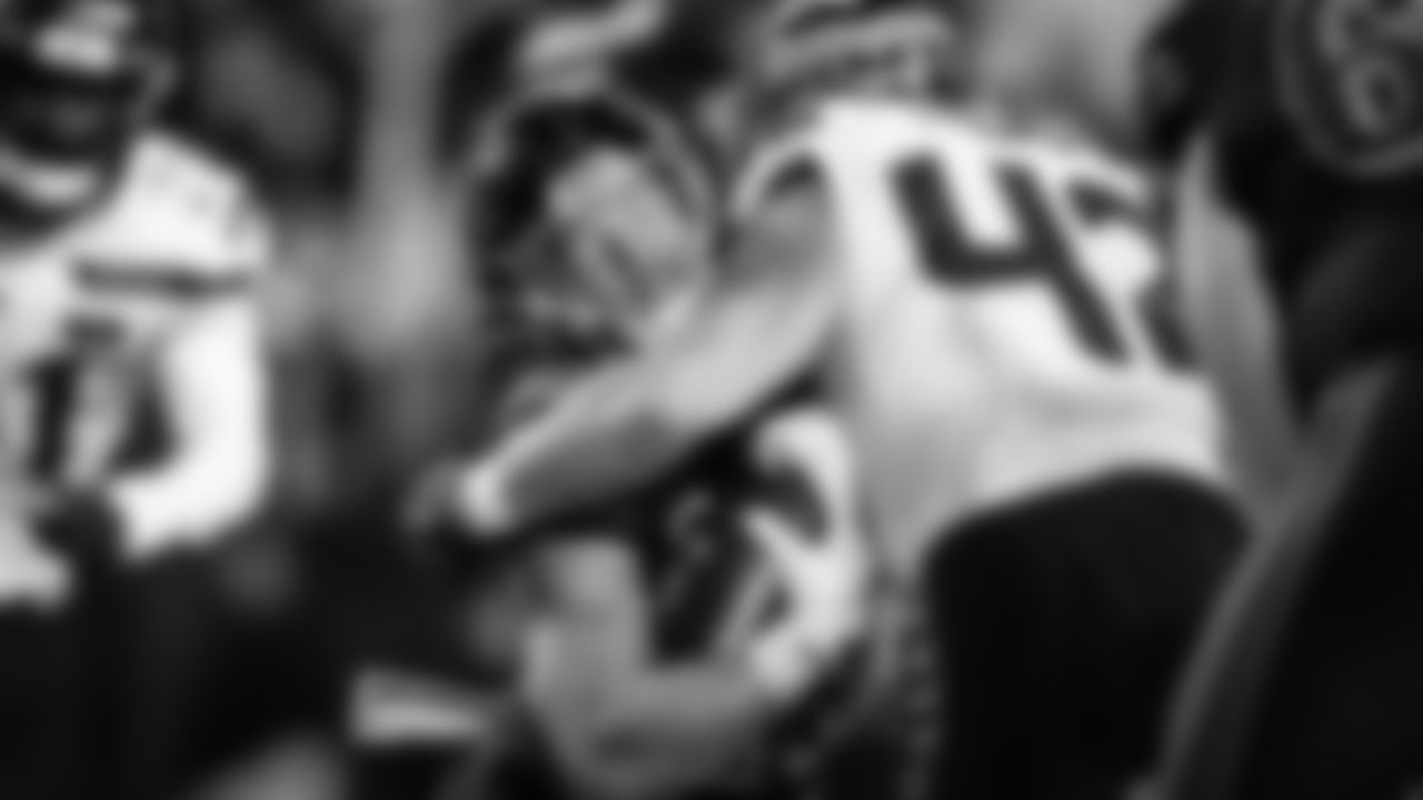 Seahawks linebacker Drake Thomas puts a punishing hit on 49ers running back Christian McCaffrey.