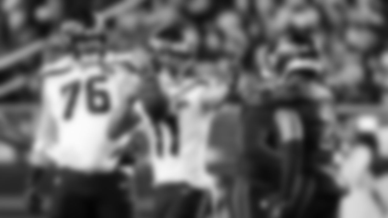 Seahawks receiver Jaxon Smith-Njigba signals after a first down.