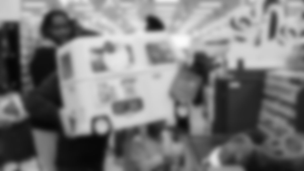 Seahawks offensive lineman Josh Jones was joined by fellow offensive linemen as they hosted a holiday shopping spree for kids from the Boys & Girls Club on December 9, 2025.