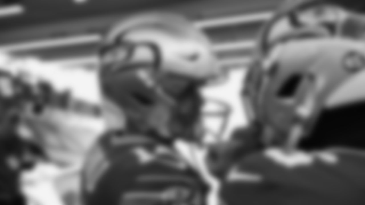 Seahawks quarterback Sam Darnold (14) walks through the Emerald Queen Casino tunnel club at Lumen Field for the Week 13 matchup vs. the Vikings.