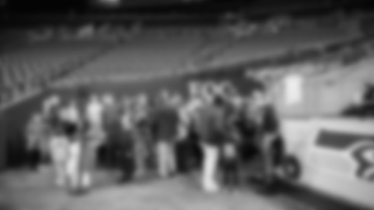 The Seahawks donated $2,500 to the Coast Guard Foundation and surprised 100 service members and their families with Seahawks talent and swag during their holiday event on December 11, 2025.