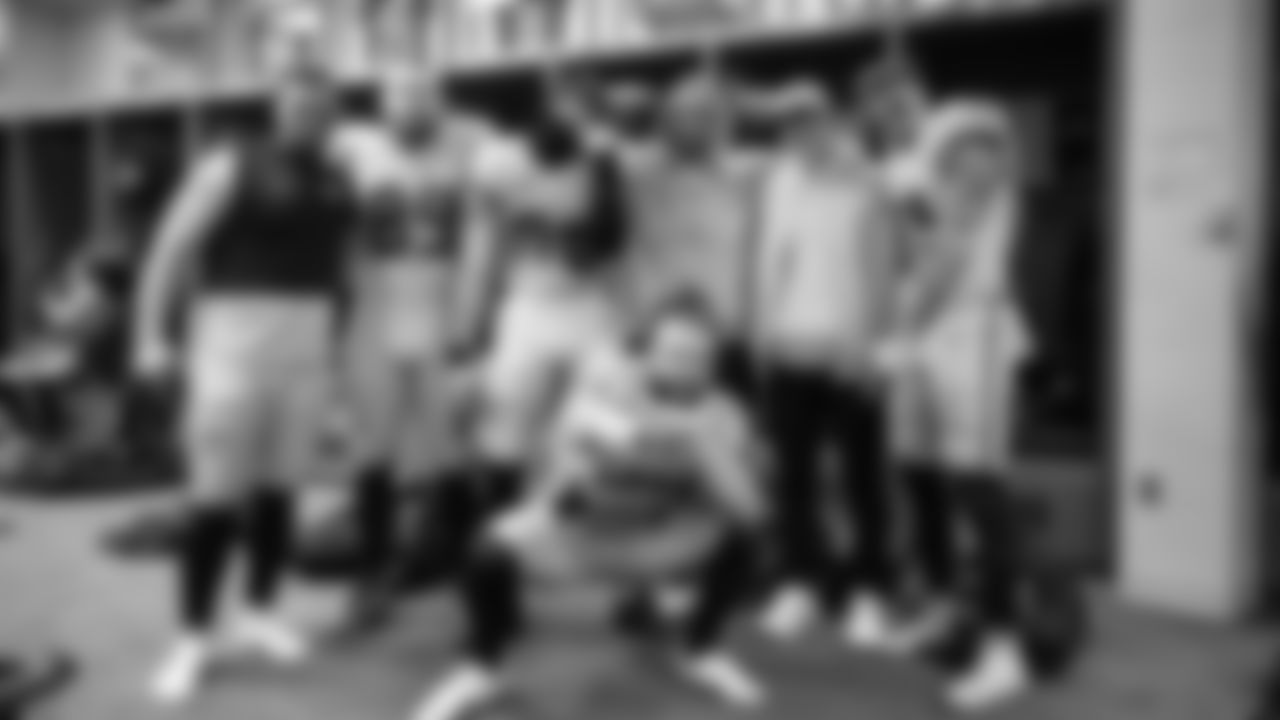 Seahawks tight ends and fullbacks pose after the win. From left are Robbie Ouzts, Nick Kallerup, AJ Barner, Elijah Arroyo, tight ends coach Mack Brown, Eric Saubert and in front, Brady Russell.