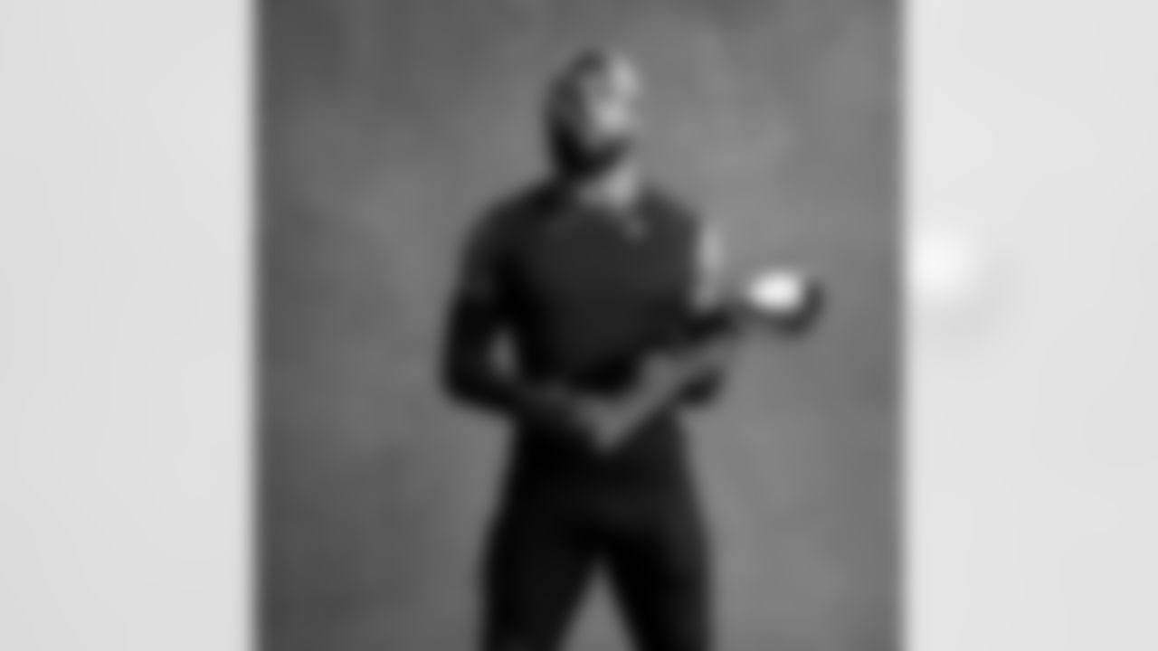 Seahawks safety Julian Love (20) with the Lombardi Trophy after winning Super Bowl LX.