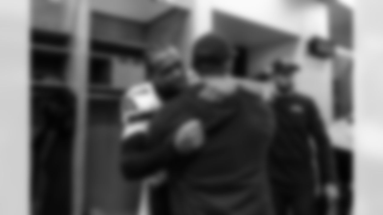 Seahawks quarterback Geno Smith (7) and head coach Mike Macdonald celebrate the Week 17 win over the Chicago Bears on Thursday, December 27, 2024.