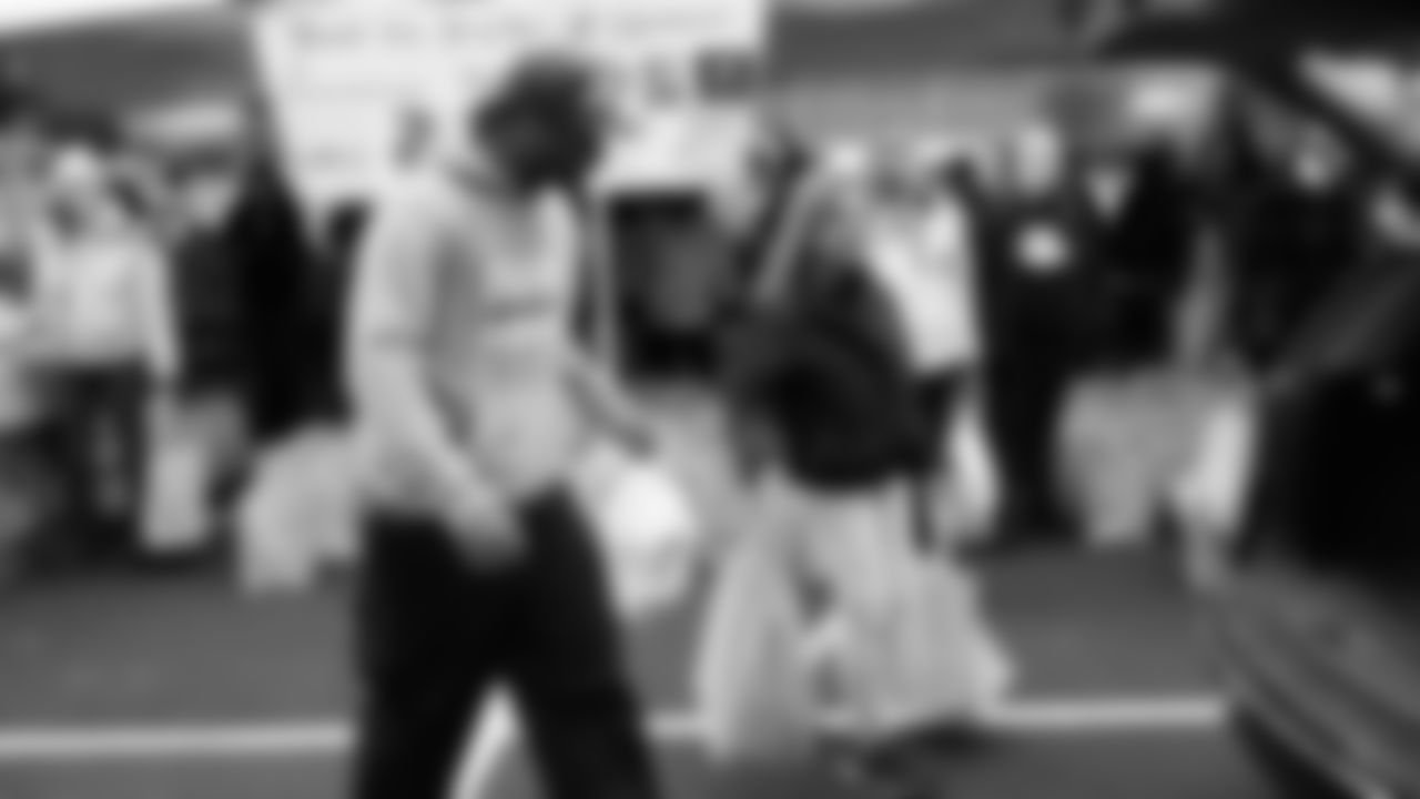 Seahawks Legend Marcus Trufant, quarterback Jalen Milroe, Blitz and the Seahawks Dancers participated in the Tacoma Police Department and Friends Thanksgiving Turkey Giveaway on November 18, 2025.