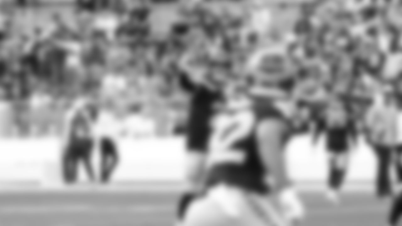 Seahawks quarterback Drew Lock (2) warms up at Lambeau Field for the preseason Week 3 matchup vs. the Green Bay Packers.