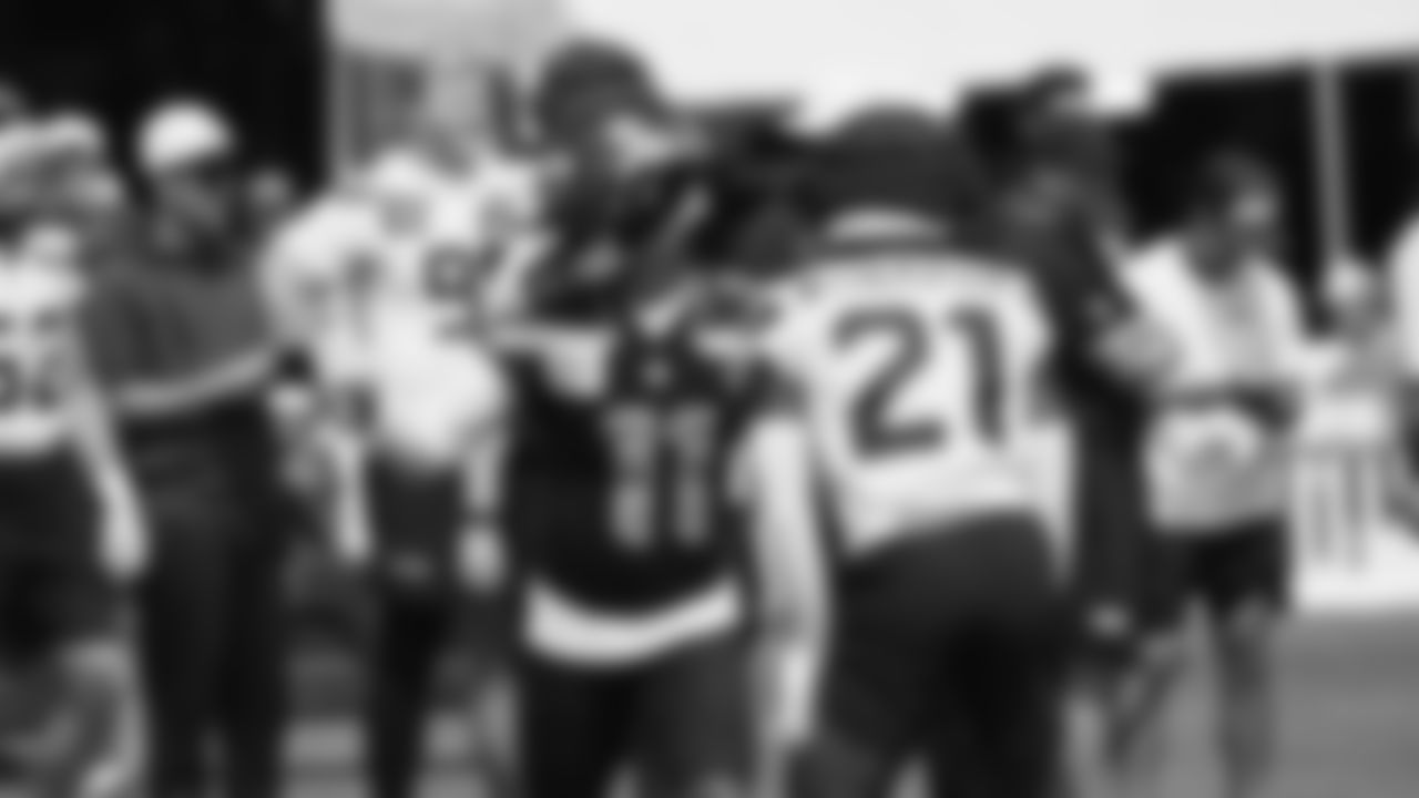 Seahawks wide receiver Jaxon Smith-Njigba (11) and cornerback Devon Witherspoon (21) practiced on August 1, 2025 at the Virginia Mason Athletic Center.