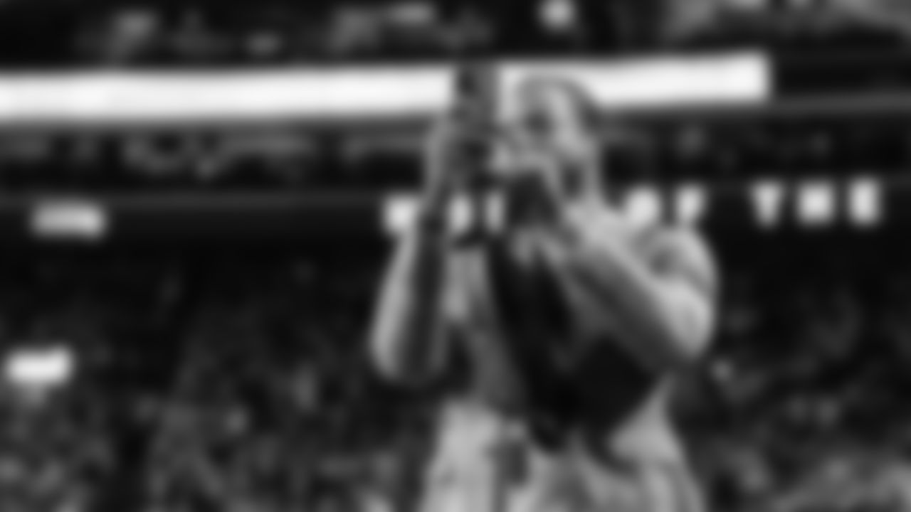 Seahawks Legend and Thursday Night Football commentator Richard Sherman records video as the 12s reached a fever pitch late in the game.