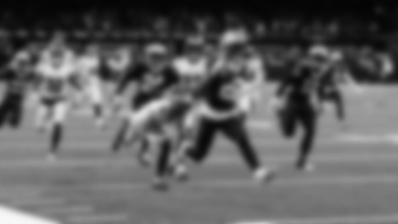 New Orleans Saints' Rashid Shaheed (22) gestures while returning a punt for a touchdown past Tampa Bay Buccaneers punter Jake Camarda (5) during the first half of an NFL football game in New Orleans, Sunday, Oct. 13, 2024. (AP Photo/Butch Dill)