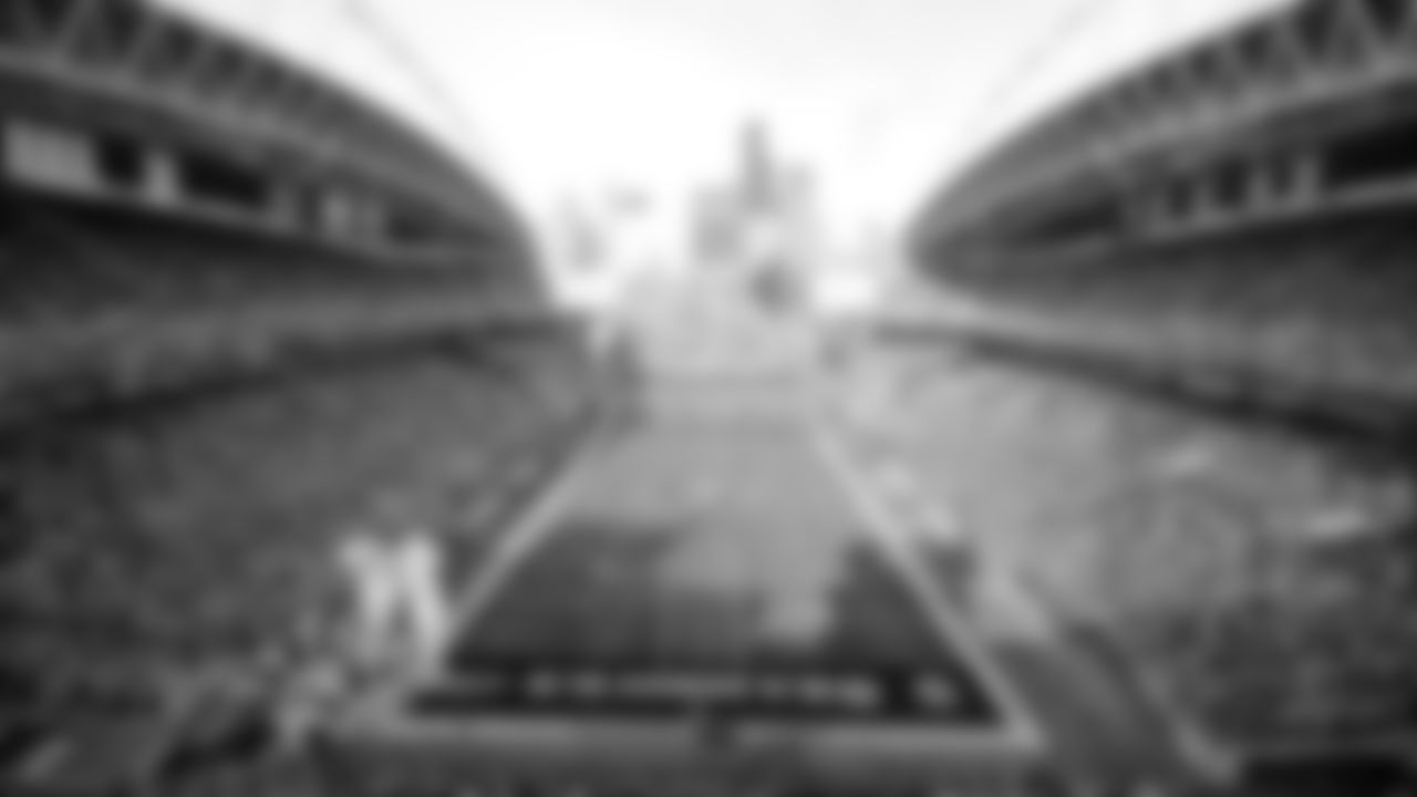 Brigadier General Richard Steve Ritchie "Cinco" of United States Air Force, raised the 12 Flag prior to kickoff of the Week 10 matchup vs. the Cardinals.