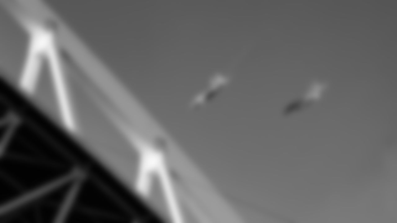 Twin F-15EX jets make a thunderous pass over the sold out crowd and the arches of Lumen Field for the NFC Championship game between the Seahawks and the Rams.