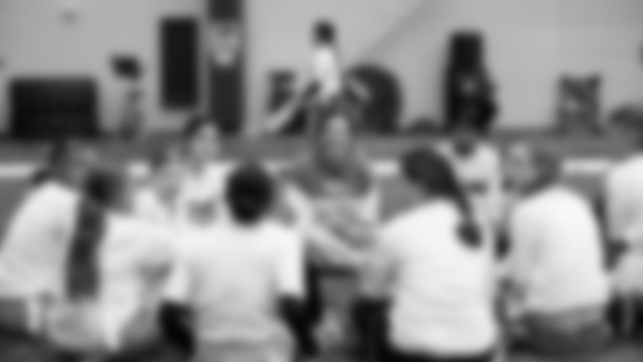 The Seahawks Women's Association packed girls flag kits and hosted a free girls flag football camp at the Seahawks training facility on Saturday, November 8, 2025.