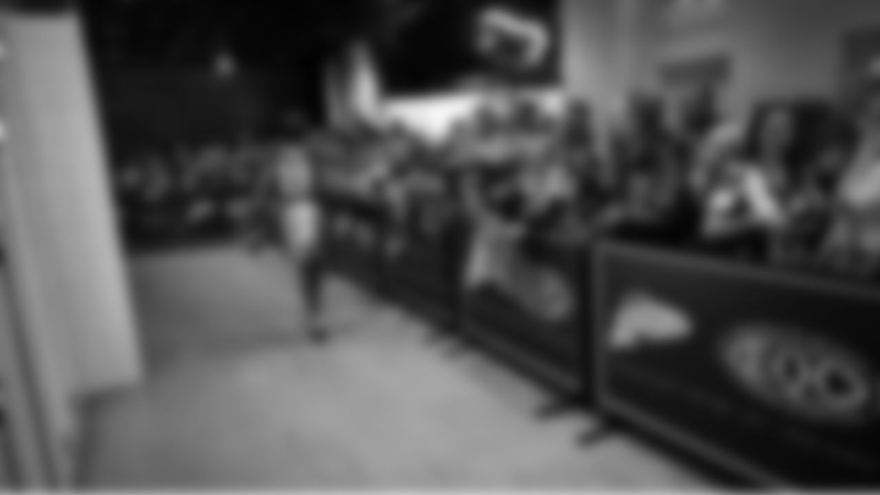 Seahawks wide receiver Jake Bobo (19) walks through the Emerald Queen Casino tunnel club at Lumen Field for the Week 5 matchup vs. the Buccaneers.
