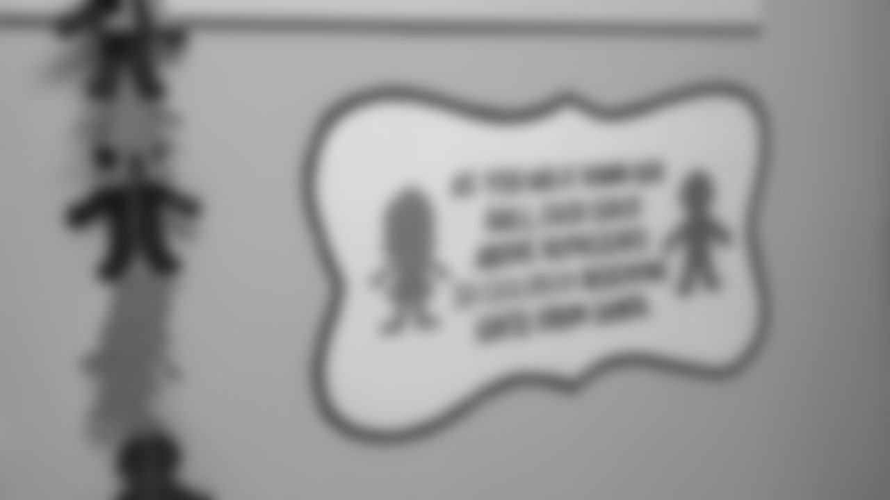 Seahawks Fullback Brady Russell, the Seahawks Dancers, and Blitz spent the day volunteering at Santa's Castle on Joint Base Lewis-McChord to celebrate the holidays and support service members and their families.