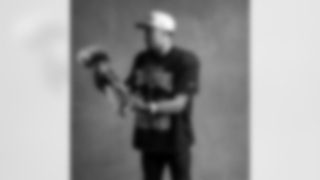 Seahawks wide receiver Jaxon Smith-Njigba (11) with the Lombardi Trophy after winning Super Bowl LX.