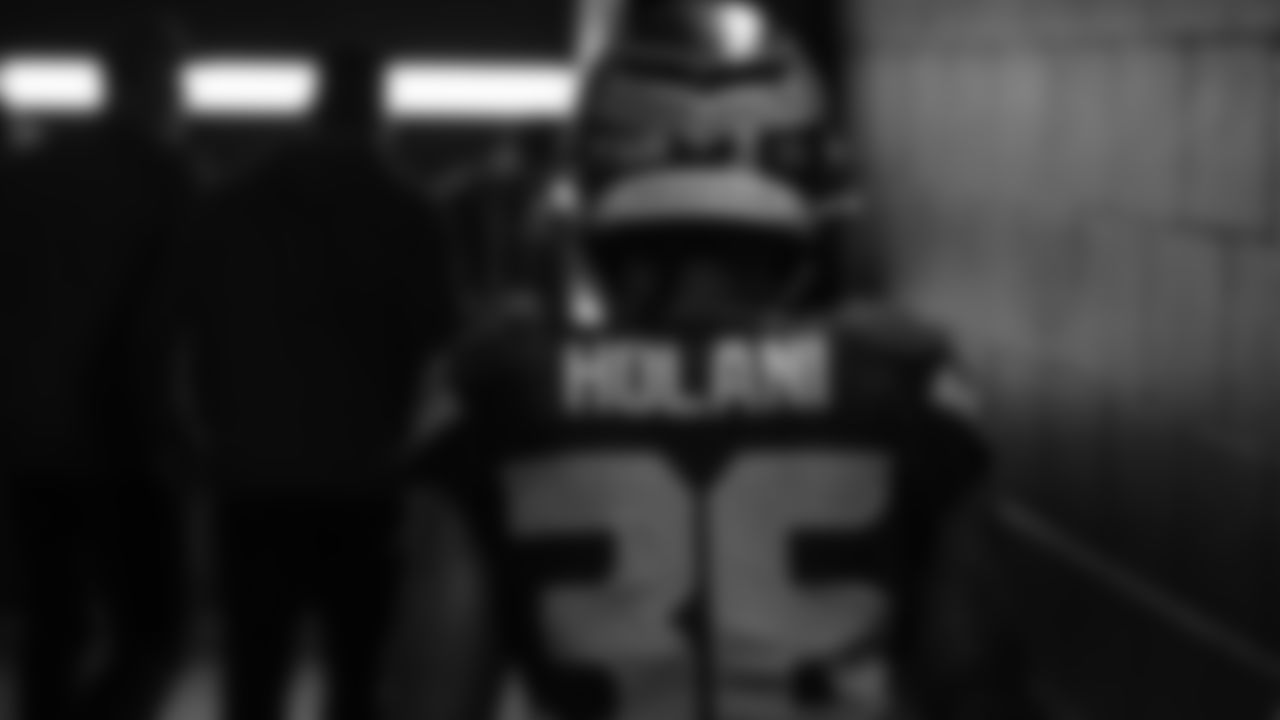 Seahawks running back George Holani (36) walks through the Emerald Queen Casino tunnel club at Lumen Field for the Week 10 matchup vs. the Cardinals.