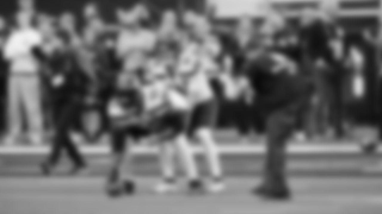 Seahawks quarterback Sam Darnold (14) and center Olu Oluwatimi (55) during pregame warmups at SoFi Stadium for the Week 11 matchup at the L.A. Rams.