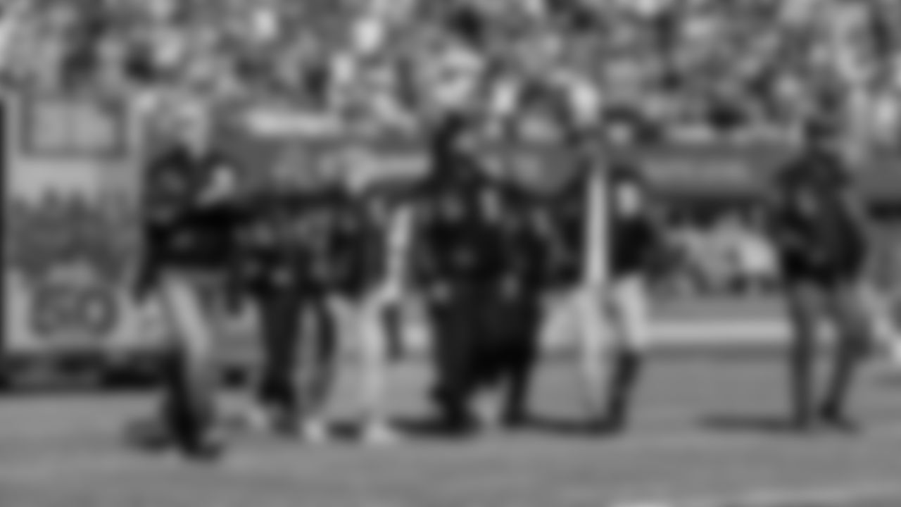 Seahawks Legends and Top 50 players from the 2010's Max Unger, Doug Baldwin, Jon Ryan, Michael Bennett, Brandon Mebane, Cliff Avril and Kam Chancellor are introduced during the Top 50 Players celebration at halftime.