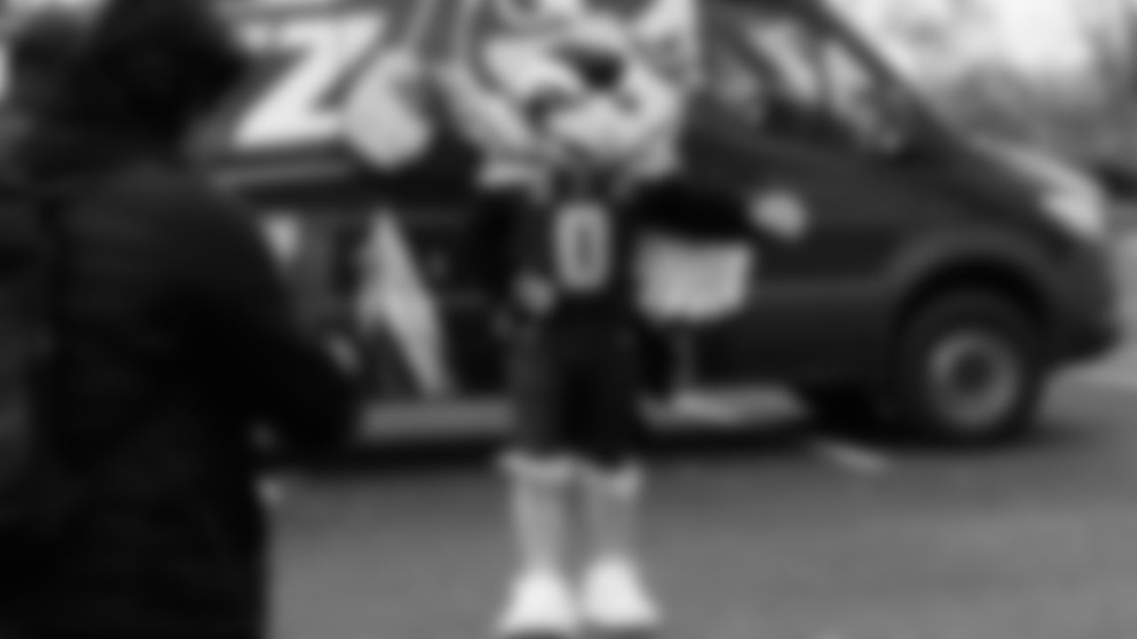 Seahawks Legend Marcus Trufant, quarterback Jalen Milroe, Blitz and the Seahawks Dancers participated in the Tacoma Police Department and Friends Thanksgiving Turkey Giveaway on November 18, 2025.