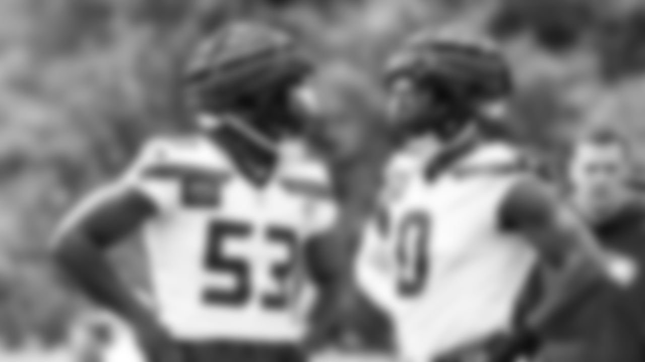 Seahawks linebacker Boye Mafe (53) and defensive end DeMarcus Lawrence (0) practiced on day three of training camp on July 25, 2025 at the Virginia Mason Athletic Center.
