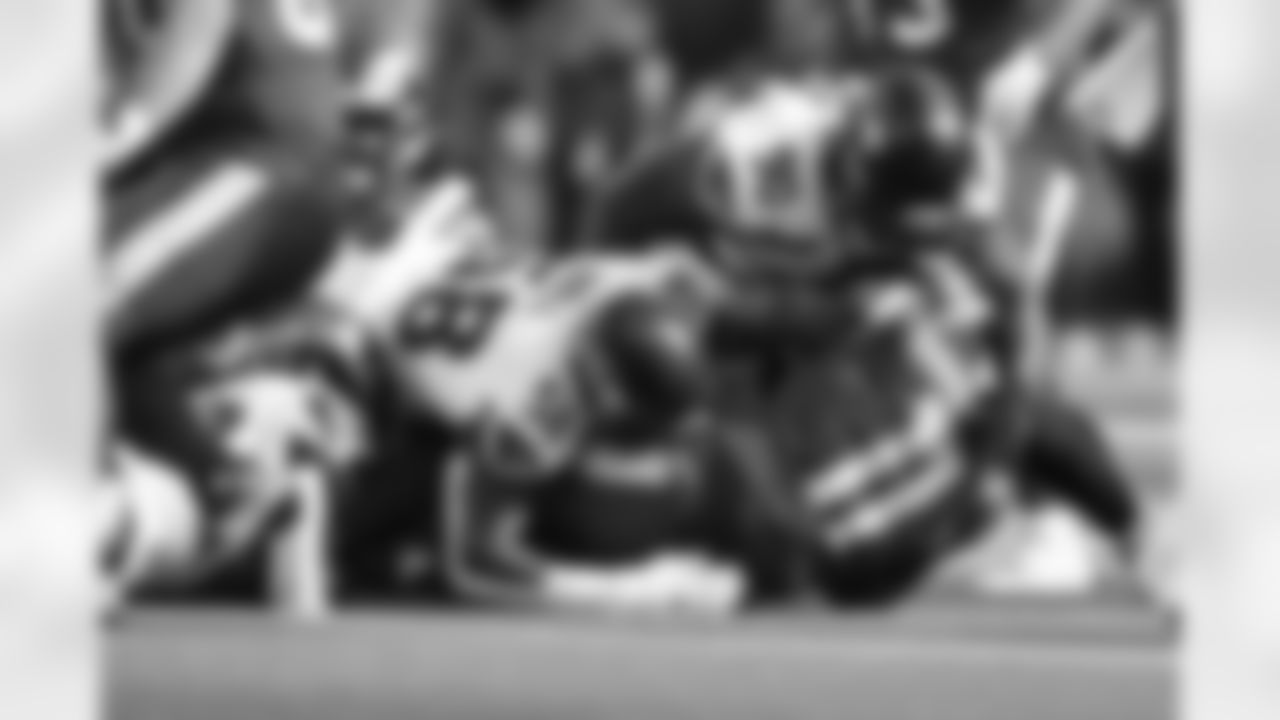 Seahawks linebacker Derick Hall (58) and Seahawks nose tackle Jarran Reed (90) at the Week 18 matchup against the Los Angeles Rams at SoFi Stadium on Sunday, January 5, 2025.