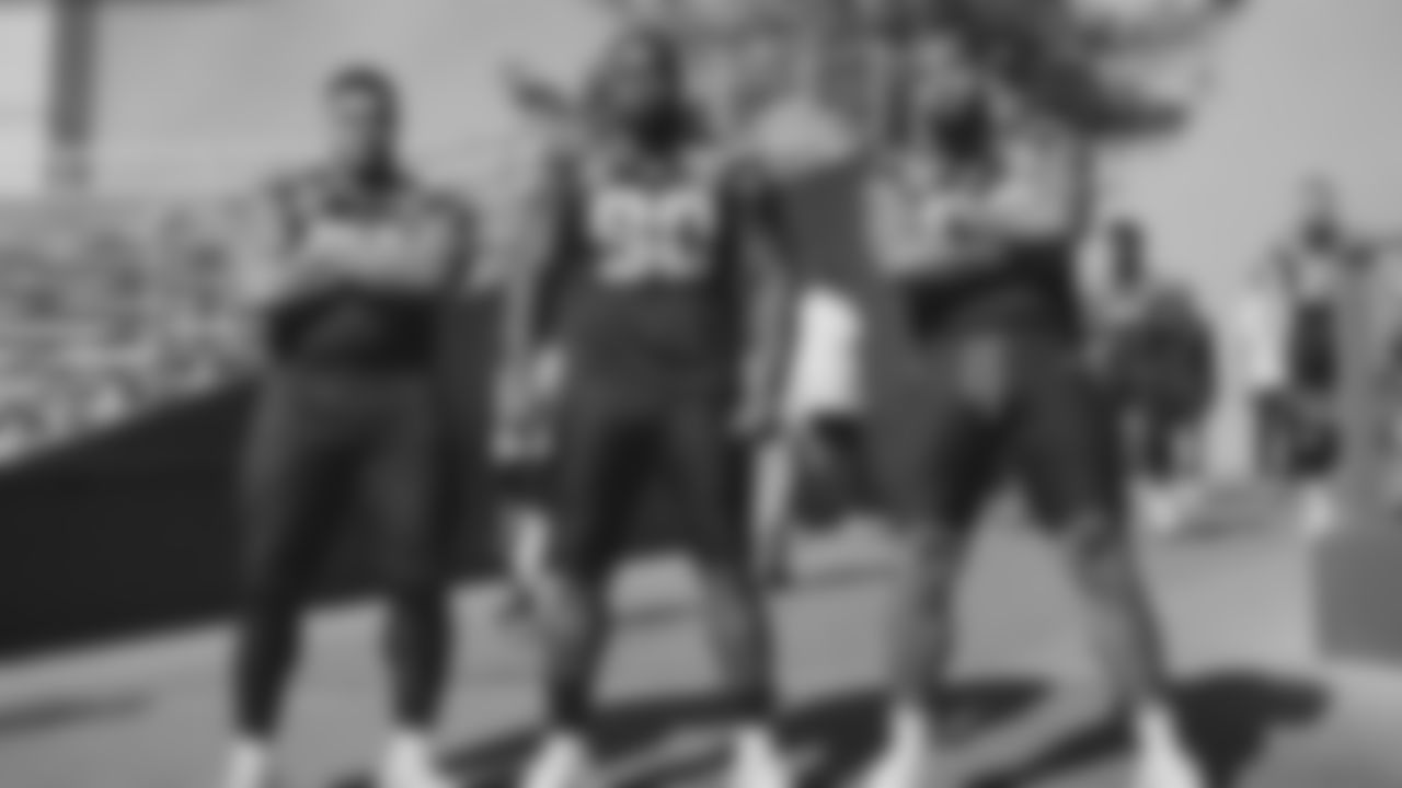 Seahawks defensive tackle Byron Murphy II (91), defensive tackle Jarran Reed (90) and defensive end Leonard Williams (99) during the Super Bowl LX team photo on February 7, 2026.