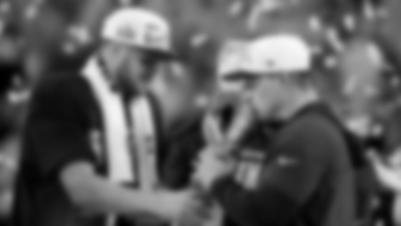 Seattle Seahawks head coach Mike MacDonald kisses the Lombardi Trophy between quarterback Sam Darnold and Seattle Seahawks chair Jody Allen after the NFL Super Bowl 60 football game, Sunday, Feb. 8, 2026, in Santa Clara, Calif. (AP Photo/Sue Ogrocki)