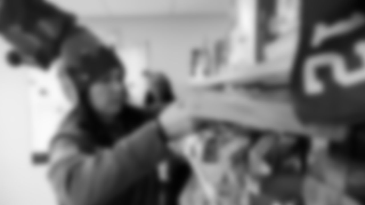 Seahawks Fullback Brady Russell, the Seahawks Dancers, and Blitz spent the day volunteering at Santa's Castle on Joint Base Lewis-McChord to celebrate the holidays and support service members and their families.