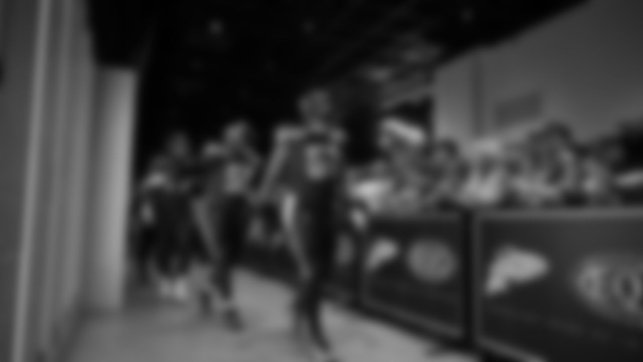 Seahawks center Jalen Sundell (61) walks through the Emerald Queen Casino tunnel club at Lumen Field for the Week 7 matchup vs. the Houston Texans.