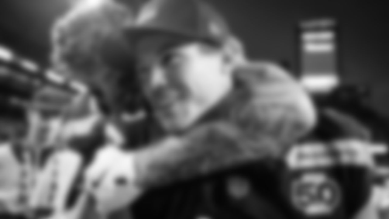 Kicker Jason Myers gets a hug from teammate Eric Saubert after the game. Myers made all six of his field goal attempts and accounted for all of Seattle's scoring in an 18-16 win over the Colts.