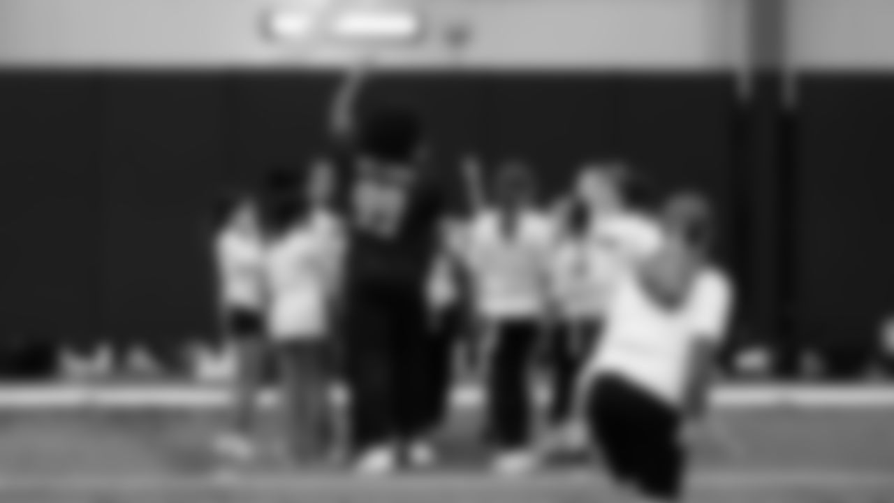 The Seahawks Women's Association packed girls flag kits and hosted a free girls flag football camp at the Seahawks training facility on Saturday, November 8, 2025.