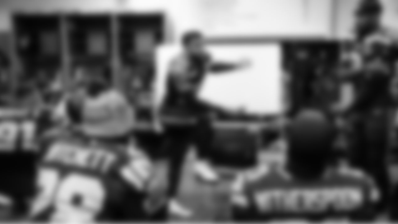 Safety Julian Love talks to the defensive backfield at halftime.