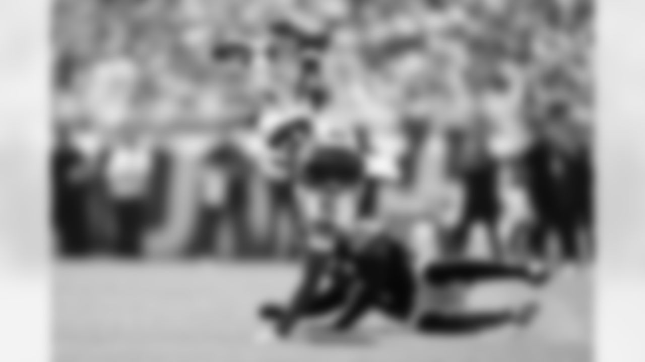 Seahawks receiver Tory Horton is upended after a catch and run in the second quarter.