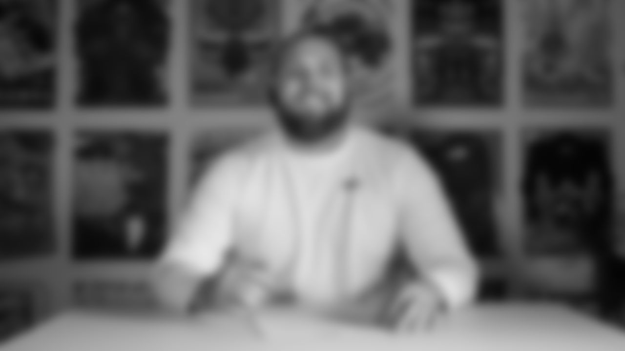 Seahawks guard Bryce Cabeldue (77) signed his rookie contract on May 12, 2025 at the Virginia Mason Athletic Center.