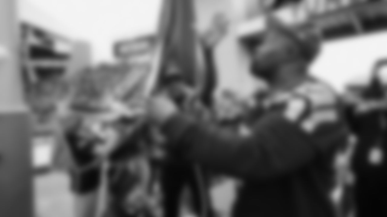 Seahawks Legends Rufus Porter and John L. Williams raise 12 flag in week 15 on December 14, 2025