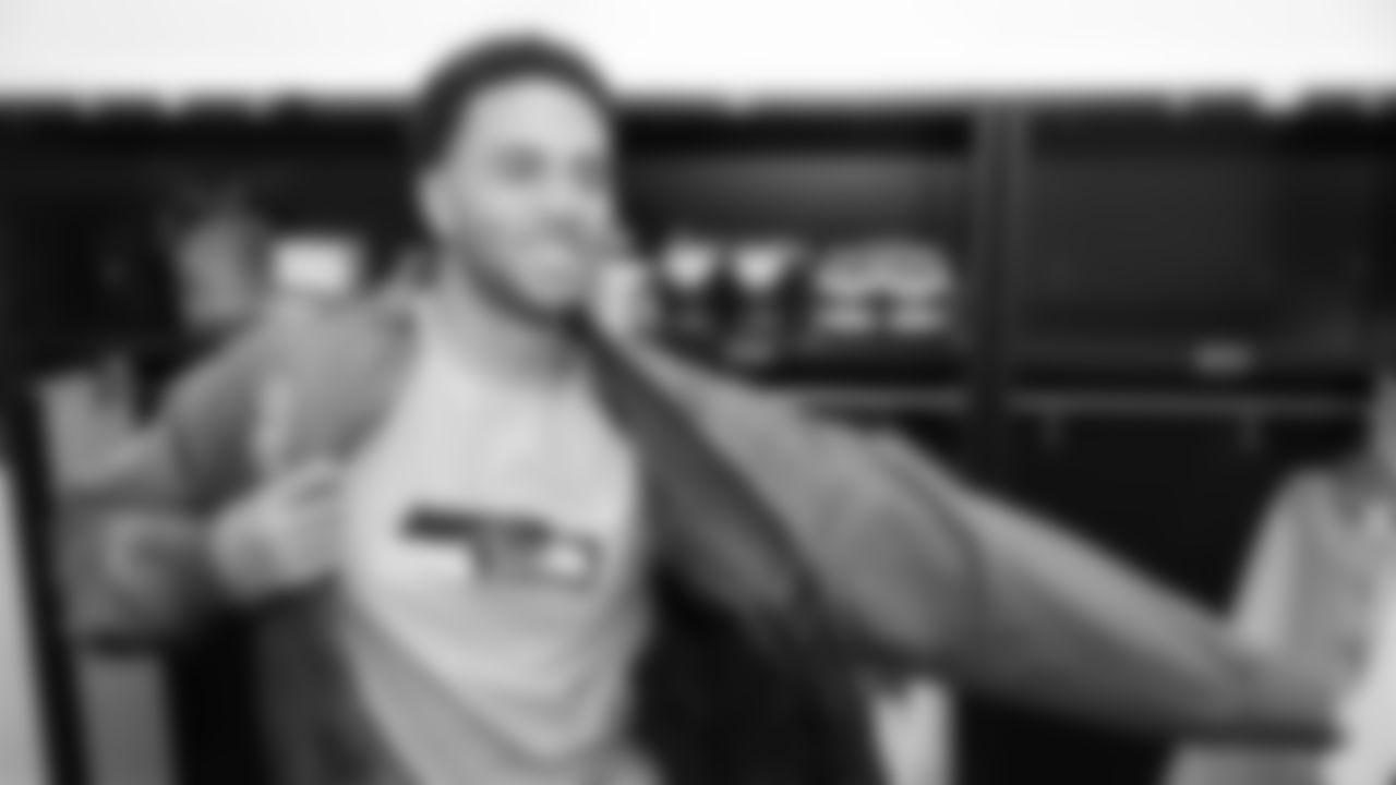 Jaedin gets ready to take the field for the Seahawks Dancers pregame performance.