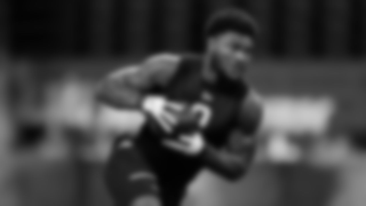 Florida State running back Cam Akers runs a drill at the NFL football scouting combine in Indianapolis, Friday, Feb. 28, 2020. (AP Photo/Charlie Neibergall)